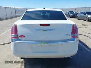 2011 Chrysler 300 with VIN 2C3CA6CTXBH559626, listed as a IAAI auction lot 41876062 with 112,045 mi miles. Bid and sale history available at carsss.com. Image 17.