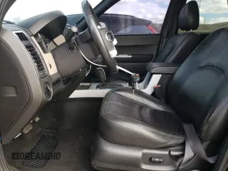 2008 Mercury Mariner Premier with VIN 4M2CU87168KJ18000, listed as a Copart auction lot 49802615 with 251,556 mi miles and Salvage title. Bid and sale history available at DreamBid. Image 7.