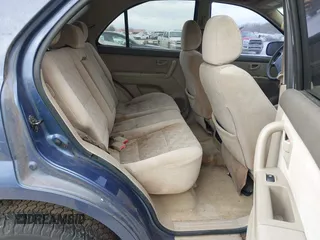 2004 Kia Sorento LX with VIN KNDJC733545221418, listed as a IAAI auction lot 41842215 with 129,177 mi miles. Bid and sale history available at carsss.com. Image 8.