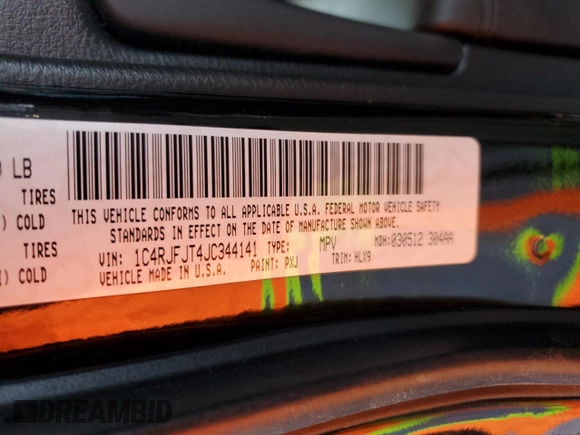 2018 Jeep Grand Cherokee Summit with VIN 1C4RJFJT4JC344141, listed as a Copart auction lot 57123685 with 86,893 mi miles and Salvage title. Bid and sale history available at DreamBid. Image 13.