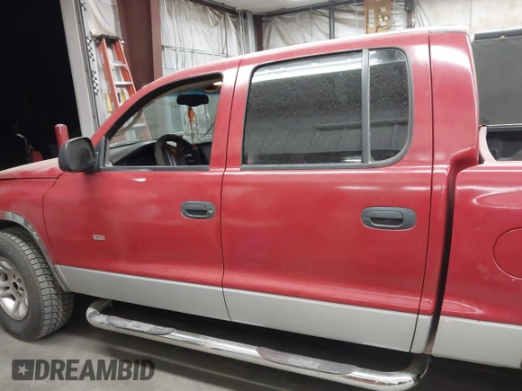 2001 Dodge Dakota Sport with VIN 1B7HL2AN81S296293, listed as a IAAI auction lot 41470036 with 203,323 mi miles. Bid and sale history available at carsss.com. Image 15.
