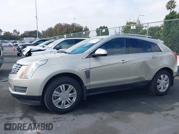 2015 Cadillac SRX Luxury Collection with VIN 3GYFNEE33FS548324, listed as a IAAI auction lot 42029979 with 70,372 mi miles. Bid and sale history available at carsss.com. Image 14.