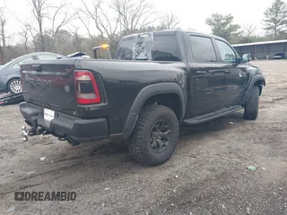2022 Ram 1500 TRX with VIN 1C6SRFU9XNN476106, listed as a IAAI auction lot 41627895 with 21,992 mi miles and . Bid and sale history available at DreamBid. Image 4.