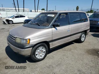 1992 Mazda MPV z VIN JM3LV5222N0453058, wystawiony jako Copart lot #72283634 z przebiegiem 174 084 mil mil oraz Szkody całkowita. Historia ofert i sprzedaży dostępna na DreamBid. Obrazek 1.