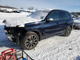 2021 BMW X5 M50i with VIN 5UXJU4C0XM9F65869, listed as a Copart auction lot 41585305 with 41,994 mi miles and Salvage Title. Bid and sale history available at carsss.com. Image 1.