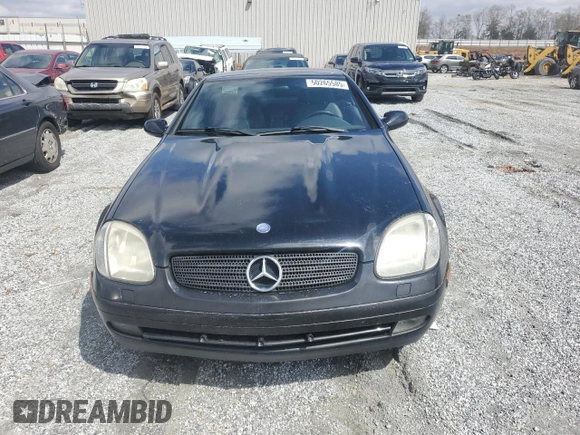 1999 Mercedes-Benz SLK-Class with VIN WDBKK47F2XF102927, listed as a Copart auction lot 50265585 with 184,918 mi miles and Salvage Title. Bid and sale history available at carsss.com. Image 5.