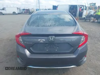2020 Honda Civic LX with VIN 2HGFC2F65LH505932, listed as a IAAI auction lot 40046863 with 59,768 mi miles and . Bid and sale history available at DreamBid. Image 17.