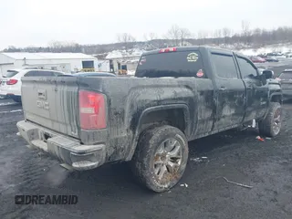 2018 GMC Sierra 1500 SLE z VIN 3GTU2MEC8JG249701, wystawiony jako IAAI lot #41556135 z przebiegiem 87 657 mil mil oraz . Historia ofert i sprzedaży dostępna na DreamBid. Obrazek 4.