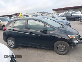 2020 Honda Fit LX z VIN 3HGGK5H40LM717305, wystawiony jako IAAI lot #42093169 z przebiegiem 69 665 mil mil oraz . Historia ofert i sprzedaży dostępna na DreamBid. Obrazek 13.