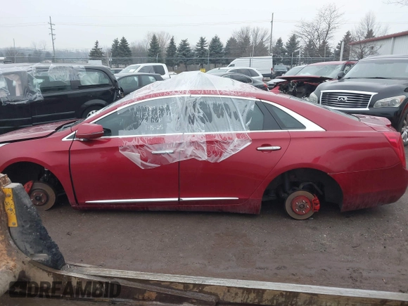 2013 Cadillac XTS Luxury with VIN 2G61R5S30D9157654, listed as a IAAI auction lot 41336844 with 159,419 mi miles and . Bid and sale history available at DreamBid. Image 13.