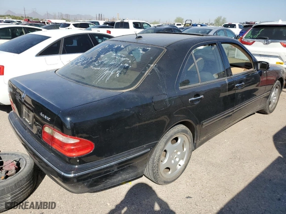 2001 Mercedes-Benz E-Class AWD with VIN WDBJF83J31X058259, listed as a Copart auction lot 74370604 with 131,454 mi miles and Clean Title. Bid and sale history available at carsss.com. Image 3.