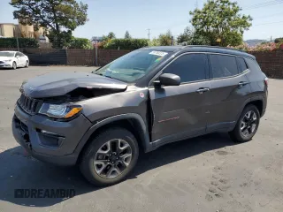 2017 Jeep Compass Trailhawk with VIN 3C4NJDDB8HT674627, listed as a Copart auction lot 59790325 with 66,349 mi miles and Salvage title. Bid and sale history available at DreamBid. Image 1.