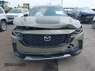 2023 Mazda CX-50 2.5 Turbo z VIN 7MMVABXY5PN131528, wystawiony jako IAAI lot #41968532 z przebiegiem 37 400 mil mil oraz . Historia ofert i sprzedaży dostępna na DreamBid. Obrazek 13.