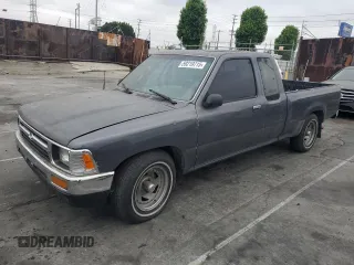 1993 Toyota Pickup with VIN JT4VN93G5P5037837, listed as a Copart auction lot 59219715 with 220,584 mi miles and Salvage title. Bid and sale history available at DreamBid. Image 1.