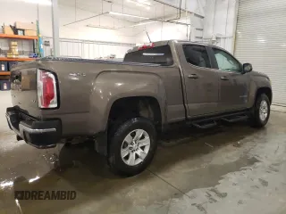 2015 GMC Canyon 4WD SLE z VIN 1GTG6BE3XF1242163, wystawiony jako Copart lot #57132035 z przebiegiem 110 241 mil mil oraz Szkoda całkowita • Salvage title. Historia ofert i sprzedaży dostępna na DreamBid. Obrazek 3.