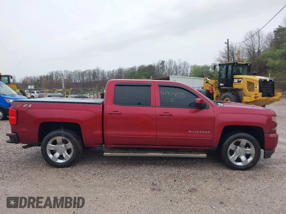 2018 Chevrolet Silverado 1500 LT with VIN 3GCUKREC2JG201754, listed as a IAAI auction lot 41944175 with 112,305 mi miles. Bid and sale history available at carsss.com. Image 14.