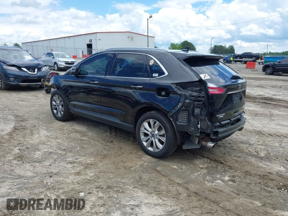 2020 Ford Edge Titanium z VIN 2FMPK4K90LBA55977, wystawiony jako IAAI lot #42257174 z przebiegiem 121 079 mil mil oraz . Historia ofert i sprzedaży dostępna na DreamBid. Obrazek 3.
