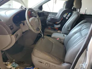 2010 Toyota Sienna XLE with VIN 5TDYK4CCXAS323450, listed as a Copart auction lot 62491545 with 220,121 mi miles and Salvage title. Bid and sale history available at DreamBid. Image 7.