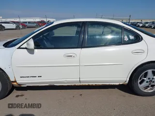 2003 Pontiac Grand Prix SE z VIN 1G2WK52J93F126127, wystawiony jako IAAI lot #42078346 z przebiegiem 236 183 mil mil oraz . Historia ofert i sprzedaży dostępna na DreamBid. Obrazek 14.