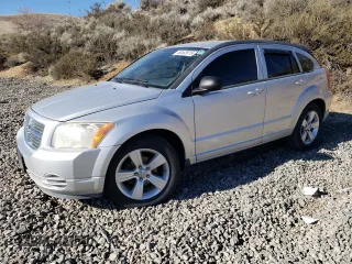 2010 Dodge Caliber SXT with VIN 1B3CB4HA3AD618890, listed as a Copart auction lot 50532615 with 126,068 mi miles and Salvage Title. Bid and sale history available at DreamBid. Image 1.