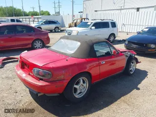 1991 Mazda MX-5 Miata Special Edition with VIN JM1NA351XM1213723, listed as a IAAI auction lot 41977042 with 125,285 mi miles. Bid and sale history available at carsss.com. Image 4.