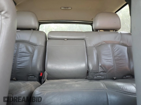 2002 Chevrolet Tahoe LT z VIN 1GNEK13Z32J217370, wystawiony jako Copart lot #59101035 z przebiegiem 225 247 mil mil oraz Czysty tytuł • Clean title. Historia ofert i sprzedaży dostępna na DreamBid. Obrazek 10.