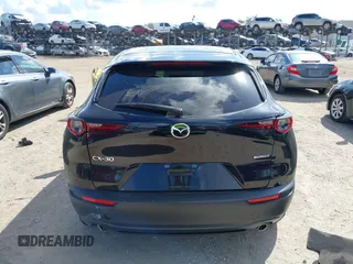 2021 Mazda CX-30 Select z VIN 3MVDMABL1MM251761, wystawiony jako IAAI lot #42267217 z przebiegiem 42 617 mil mil oraz . Historia ofert i sprzedaży dostępna na DreamBid. Obrazek 15.