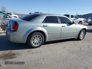 2005 Chrysler 300 with VIN 2C3JA43R95H168570, listed as a Copart auction lot 87672695 with 82,171 mi miles and Salvage Title. Bid and sale history available at carsss.com. Image 3.