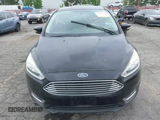 2017 Ford Focus Titanium with VIN 1FADP3N2XHL230766, listed as a IAAI auction lot 42386275 with 64,138 mi miles and . Bid and sale history available at DreamBid. Image 12.