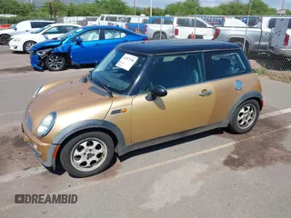 2004 MINI Hardtop with VIN WMWRC33474TC48930, listed as a IAAI auction lot 41657936 with 147,422 mi miles and . Bid and sale history available at DreamBid. Image 2.