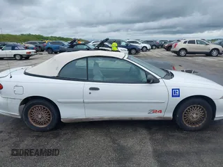 1998 Chevrolet Cavalier Z24 with VIN 4G1JF32T5WB900084, listed as a IAAI auction lot 40502402 with 0 mi miles. Bid and sale history available at carsss.com. Image 12.