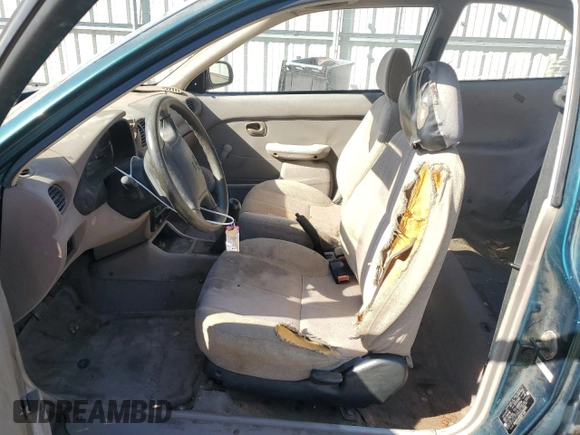1999 Hyundai Accent z VIN KMHVD14N4XU456698, wystawiony jako Copart lot #41733345 z przebiegiem 197 574 mil mil oraz Szkody całkowita. Historia ofert i sprzedaży dostępna na DreamBid. Obrazek 7.