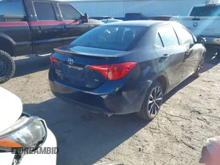 2017 Toyota Corolla L z VIN 5YFBURHE0HP721258, wystawiony jako IAAI lot #41706824 z przebiegiem 158 554 mil mil oraz . Historia ofert i sprzedaży dostępna na DreamBid. Obrazek 4.