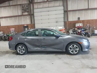 2016 Honda Civic Sedan LX with VIN 19XFC2F58GE214672, listed as a IAAI auction lot 42067792 with 73,929 mi miles. Bid and sale history available at carsss.com. Image 12.