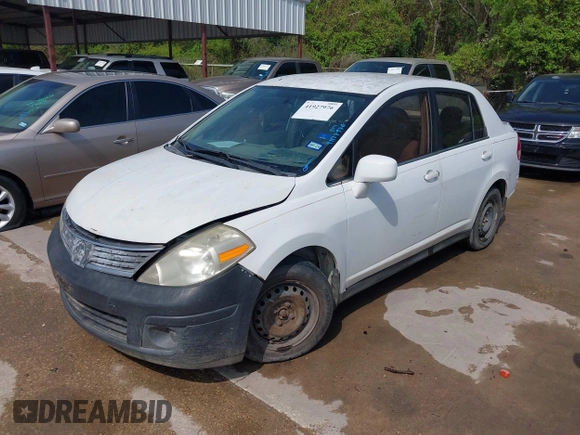 2008 Nissan Versa 1.8 S with VIN 3N1BC11E38L392277, listed as a IAAI auction lot 41927976 with 135,795 mi miles. Bid and sale history available at carsss.com. Image 2.