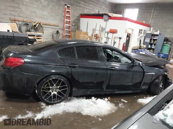2014 BMW 6 Series 650i xDrive with VIN WBA6B4C56ED760482, listed as a IAAI auction lot 41384990 with 64,863 mi miles. Bid and sale history available at carsss.com. Image 13.