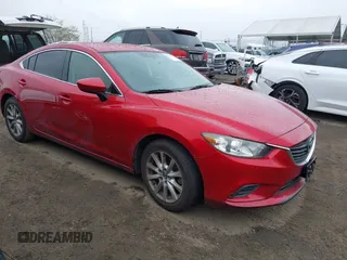 2016 Mazda 6 i Sport with VIN JM1GJ1U54G1457194, listed as a IAAI auction lot 41725704 with 109,628 mi miles and . Bid and sale history available at DreamBid. Image 1.