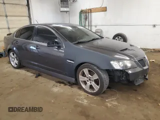 2009 Pontiac G8 z VIN 6G2ER57739L205634, wystawiony jako Copart lot #58935145 z przebiegiem 181 490 mil mil oraz Czysty tytuł • Clean title. Historia ofert i sprzedaży dostępna na DreamBid. Obrazek 4.