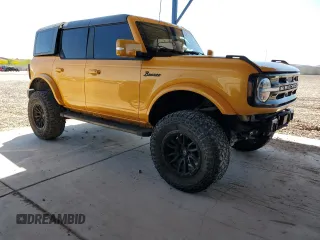 2022 Ford Bronco with VIN 1FMEE5BP8NLB30916, listed as a Copart auction lot 54632415 with 33,316 mi miles and Salvage title. Bid and sale history available at DreamBid. Image 4.