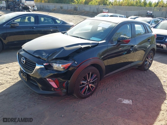 2018 Mazda CX-3 Touring with VIN JM1DKFC75J1302046, listed as a IAAI auction lot 40570799 with 62,554 mi miles. Bid and sale history available at carsss.com. Image 17.