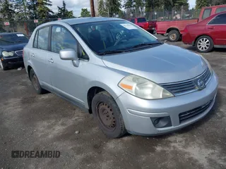 2009 Nissan Versa 1.8 S with VIN 3N1BC11E19L375222, listed as a IAAI auction lot 41736533 with 197,946 mi miles. Bid and sale history available at carsss.com. Image 1.