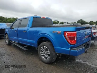 2021 Ford F-150 XL with VIN 1FTFW1E82MKD43741, listed as a Copart auction lot 65923804 with 86,506 mi miles and Salvage Title. Bid and sale history available at carsss.com. Image 2.