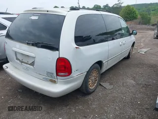 1998 Chrysler Town & Country LXi with VIN 1C4GP64L9WB664179, listed as a IAAI auction lot 42041600 with 1 mi miles. Bid and sale history available at carsss.com. Image 4.