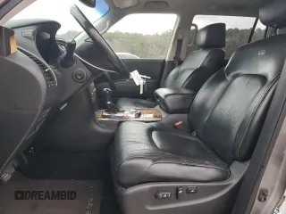 2012 Infiniti QX56 8-passenger with VIN JN8AZ2ND4C9715207, listed as a Copart auction lot 43283955 with 191,935 mi miles and Salvage title. Bid and sale history available at DreamBid. Image 7.