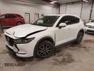 2018 Mazda CX-5 S Premium with VIN JM3KFBDM1J1412088, listed as a IAAI auction lot 41497431 with 65,532 mi miles and . Bid and sale history available at DreamBid. Image 17.
