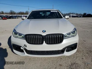 2017 BMW 7 Series 750i with VIN WBA7F0C39HGM22030, listed as a Copart auction lot 87127484 with 110,634 mi miles and Salvage title. Bid and sale history available at DreamBid. Image 5.