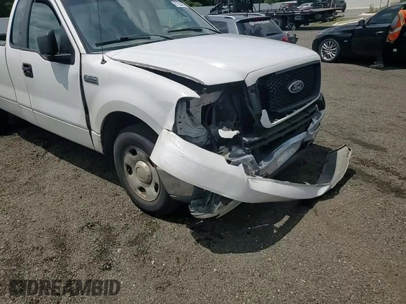 2005 Ford F-150 XL with VIN 1FTVF12585NA40842, listed as a Copart auction lot 61728465 with 288,002 mi miles and Salvage title. Bid and sale history available at DreamBid. Image 13.