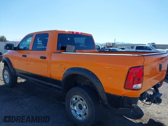 2014 Ram 2500 Tradesman z VIN 3C6TR5CTXEG235098, wystawiony jako IAAI lot #41831596 z przebiegiem 97 540 mil mil oraz . Historia ofert i sprzedaży dostępna na DreamBid. Obrazek 3.