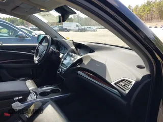 2016 Acura MDX w/Tech with VIN 5FRYD4H4XGB044488, listed as a IAAI auction lot 41963890 with 168,386 mi miles. Bid and sale history available at carsss.com. Image 5.