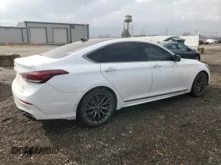 2018 Genesis G80 Sport with VIN KMHGN4JB7JU241681, listed as a Copart auction lot 49821055 with 99,833 mi miles and Salvage title. Bid and sale history available at DreamBid. Image 3.